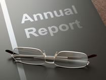 Glasses folded on top of Annual Report