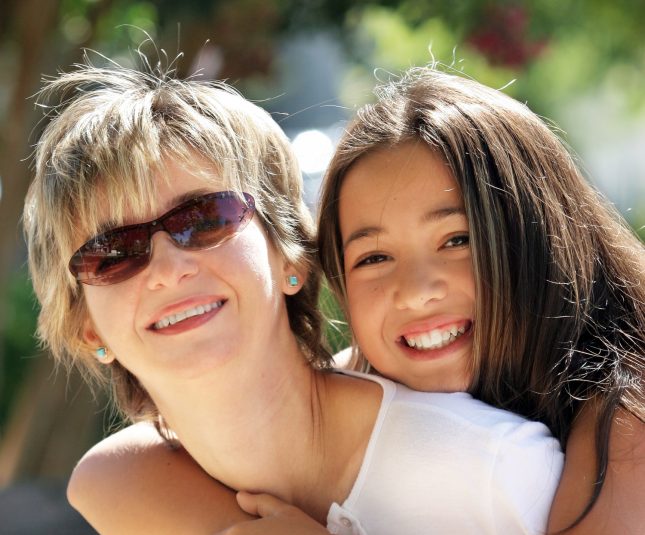 Girl hugging her mother